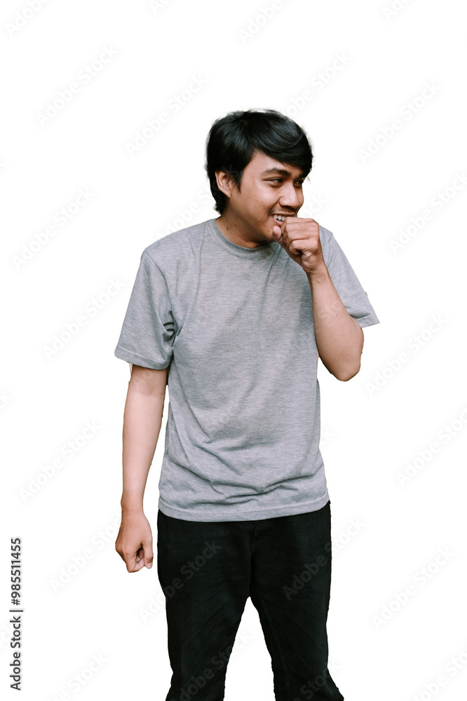 Southeast Asian man coughing, showing a concerned expression. Southeast Asian man coughing, showing a concerned expression.