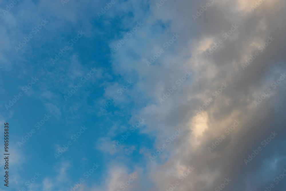 The sky is blue with a few clouds scattered throughout The sky is blue with a few clouds scattered throughout