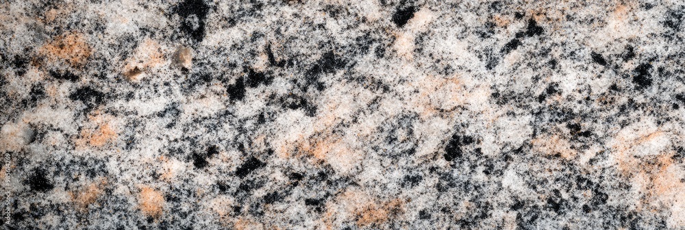 Granite countertop texture with natural speckles and polished finish