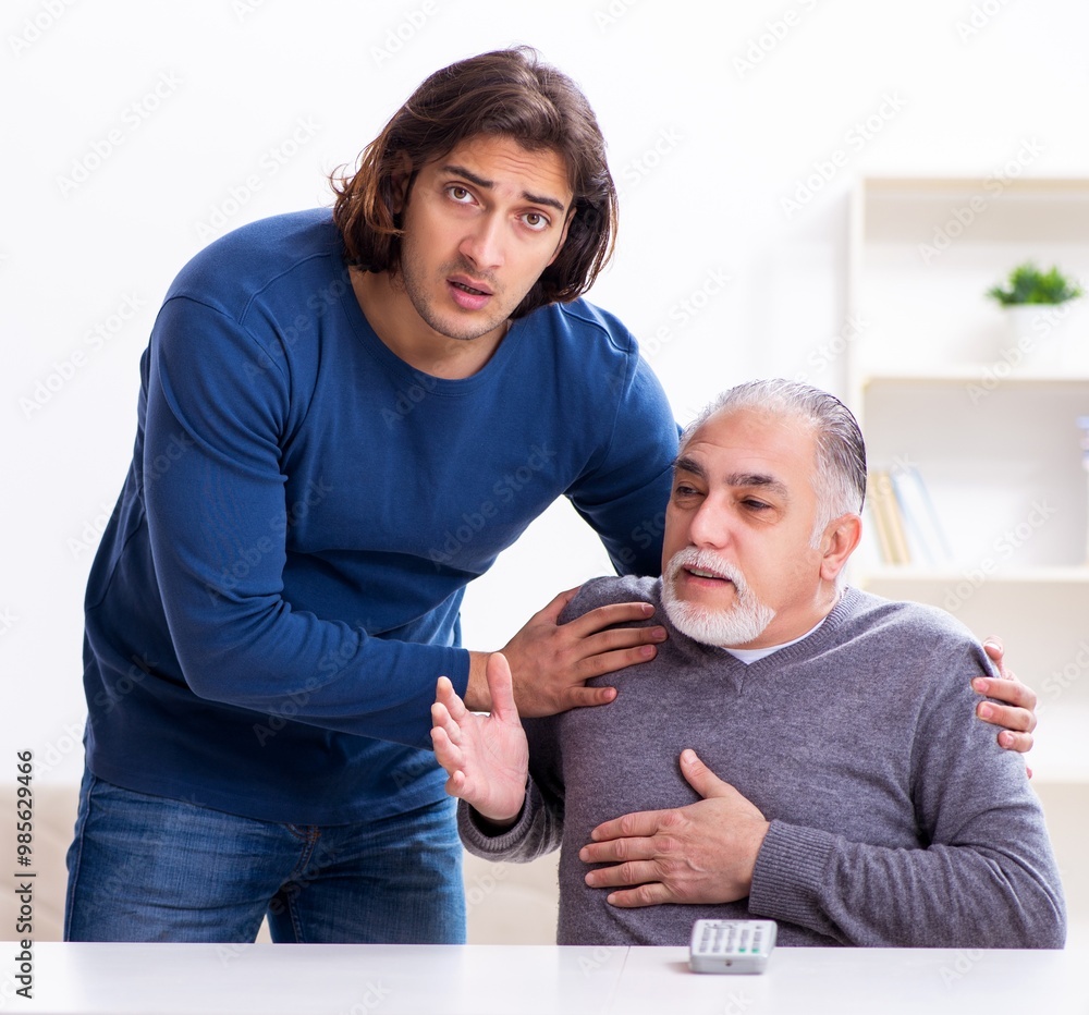 Grandfather and grandson in first aid concept Grandfather and grandson in first aid concept