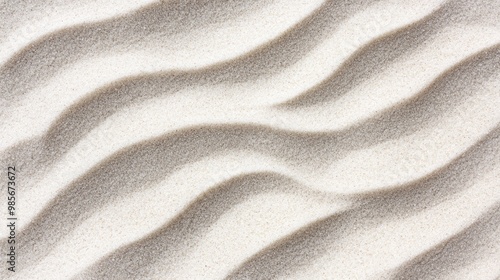 Close-up of wavy sand pattern in the beach.