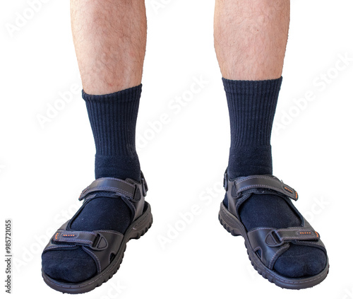 Man legs wearing black socks with sandals isolated.