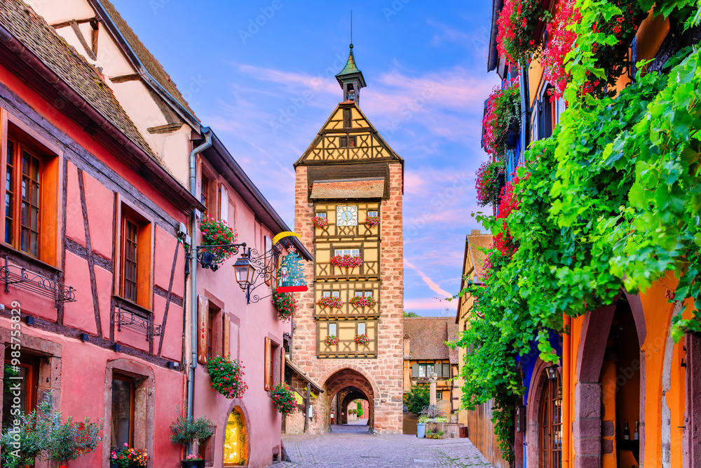 Riquewihr, France. Picturesque street with traditional half timbered houses on the Alsace Wine Route.