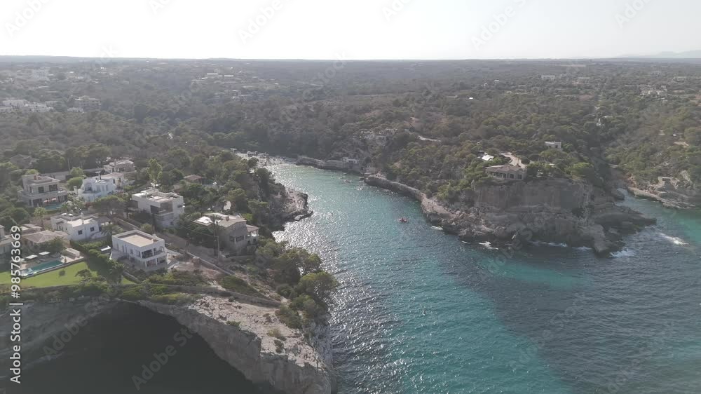 Aerial view of floating boats in Cala Llombards spain Aerial view of floating boats in Cala Llombards spain