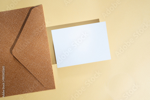 Paper envelopes on a light background. New mail, write a message. Send and receive mail. Postal delivery service. Empty envelope, empty space. Communication with people, paperwork. Envelope close-up