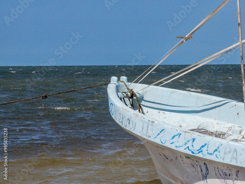 Small boat anchored at the seashore