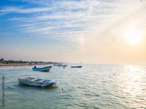 Small boat anchored at the seashore