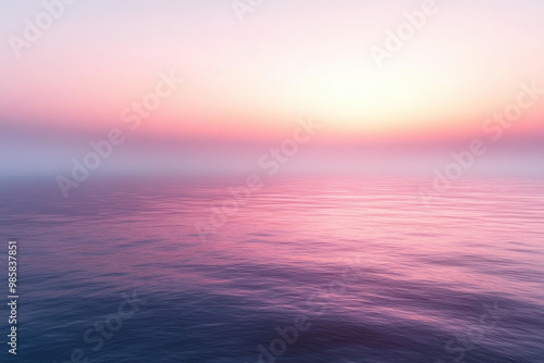 A serene ocean view at sunrise, showcasing subtle gradient that begins with soft lavender hue, blending into pink and blue tones. calm water reflects tranquil atmosphere