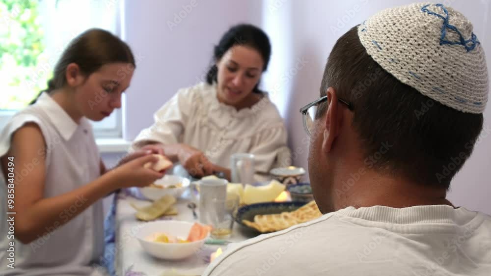 jewish family celebrating hanukkah, israel, boy in kippah, jewish holidays, yom kippur feast, table with food, honey, donuts, family holiday, religious family, family praying, Jewish woman jewish family celebrating hanukkah, israel, boy in kippah, jewish holidays, yom kippur feast, table with food, honey, donuts, family holiday, religious family, family praying, Jewish woman