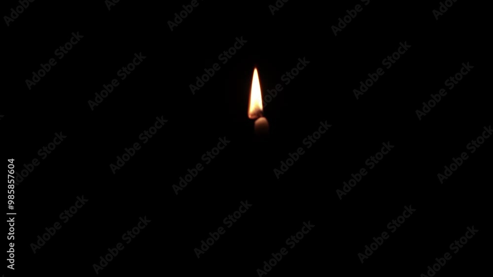 Taper Candle Burning in Darkness Taper Candle Burning in Darkness