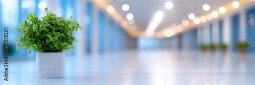 Exhibition hall or convention centre corridor background with blurred, defocused bokeh. Contemporary corporate office background with abstract blur.
