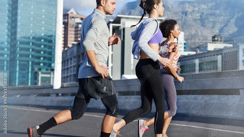 Obraz premium Running, workout and fitness with friends in city for start of training, athlete and wellness. Race, exercise and marathon cardio with people for urban, health and sports performance together