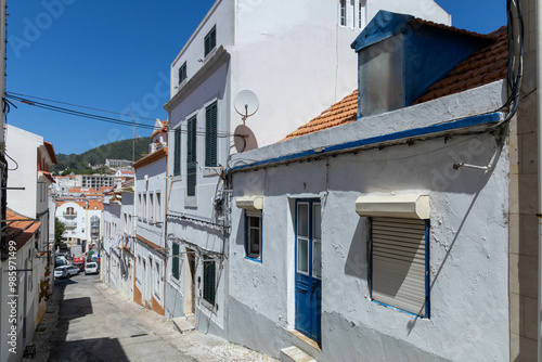 A street in the old town Sesimbra in Portugal. photo