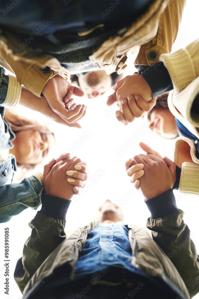© JordaanExams/peopleimages.com - Support, circle and people holding hands together for prayer, solidarity or trust from below. Team building, connection and group of friends in huddle for worship, gratitude and care for community © JordaanExams/peopleimages.com - Support, circle and people holding hands together for prayer, solidarity or trust from below. Team building, connection and group of friends in huddle for worship, gratitude and care for community
