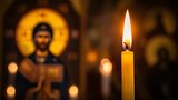A single candle, lit in front of an icon of the revered Saint Mary and Theotokos, concept of orthodox holidays, prayer, religious sacrament, God's help, prayer to the Virgin Mary