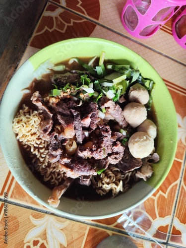 Meatballs in a bowl of noodles