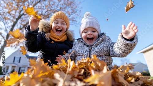 A fun outdoor autumn scene where a joyful mother and her child are actively playing with fallen leaves, laughing, and cherishing a vibrant moment together.