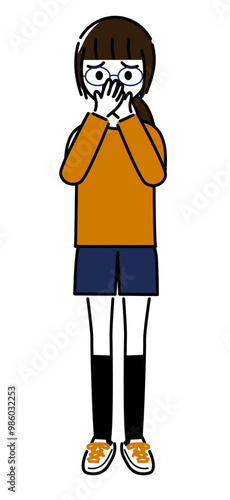 鼻と口を両手でふさぐ小学校高学年の女の子