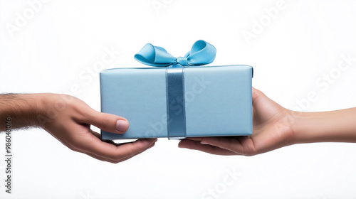 Two hands exchanging a large blue gift box against a plain background, capturing the spirit of giving and sharing during any celebration photo