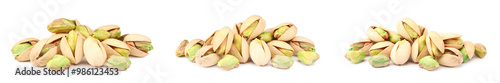 Delicious pistachios isolated on white, set. Tasty nut