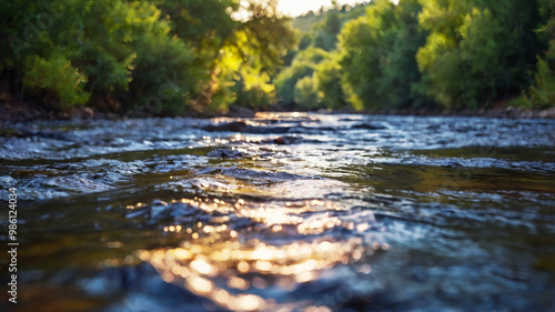 Blurred bokeh of a calm, flowing river