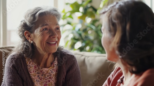 Elderly woman enjoying a mindful moment with a home care professional who provides compassionate support in a light-filled room