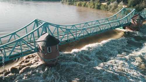 Foaming water of the Odra River at the Bartoszowicki weir during the flood in Wroclaw, Poland in September 2024