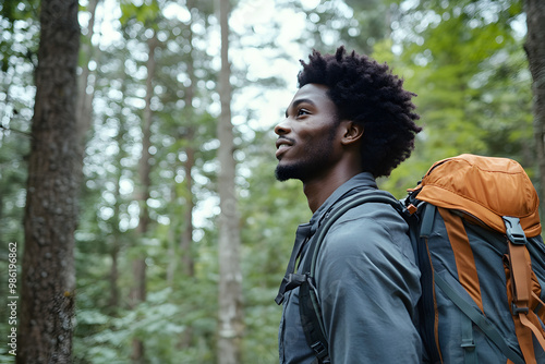 Afro-American Man Hiking in Forest, Embracing Nature and Outdoor Adventure