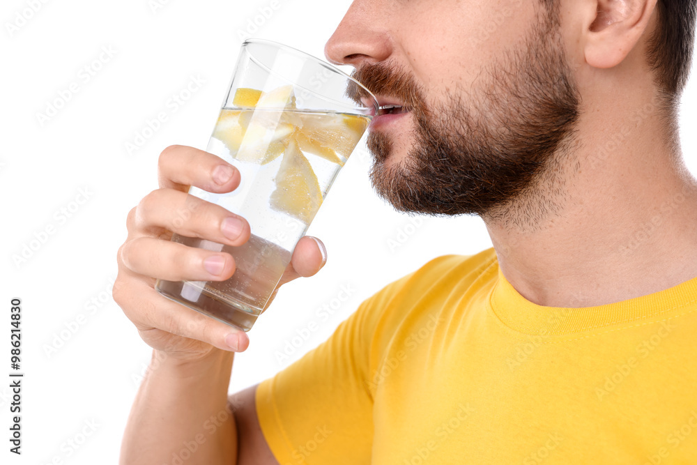 Man drinking water with lemon on white background, closeup Man drinking water with lemon on white background, closeup