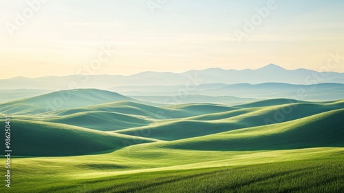 Expansive Landscape of Rolling Hills and Distant Mountains, a stunning vista featuring a clear horizon that captures the beauty of nature in all its glory