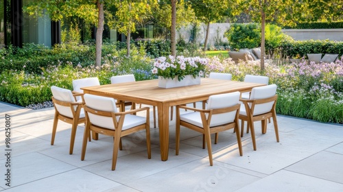 Elegant Outdoor Dining Set Surrounded by Lush Garden