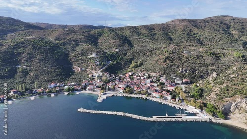 Asmali Village view from sea in Marmara Island of Turkey. Aerial view of Marmara island Cinarli , Turkey. Marmara island view from sea in Turkey. photo