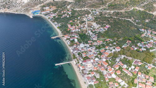 Cinarli Village view from sea in Marmara Island of Turkey. Aerial view of Marmara island Cinarli , Turkey. Marmara island view from sea in Turkey. photo