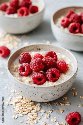 Breakfast cereal with milk yogurt and raspberry