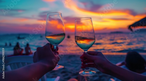 Hand holding wine glass  with tropical vacation resort sea beach
