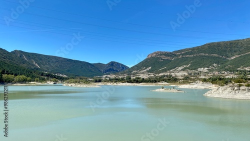 Obraz na płótnie Embalse de Arguis: A Scenic Reservoir on the Isuela River in Huesca, Spain