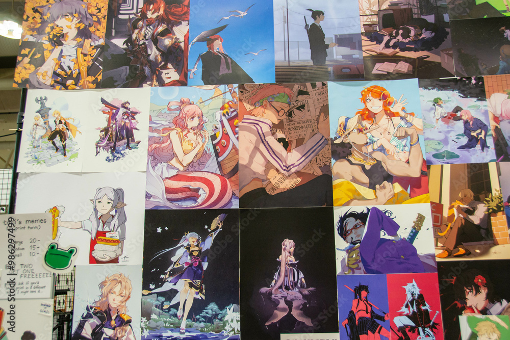 Fototapeta premium Toronto, Down Toune, On, Canada - Marth 18th, 2024: Display booths featuring comic books, art, and t-shirts at Planet Comicon. High quality photo