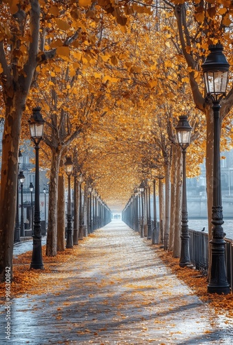 Enchanting autumn pathway lined with golden trees and vintage lamps in a quie...
