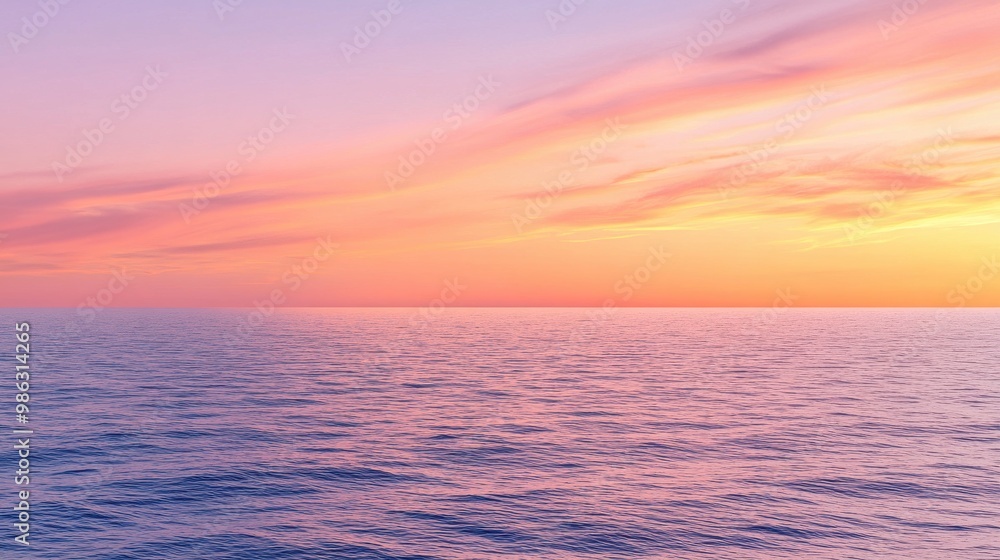 Vibrant sunset sky with a mix of soft orange, pink, and purple tones above a calm sea Vibrant sunset sky with a mix of soft orange, pink, and purple tones above a calm sea