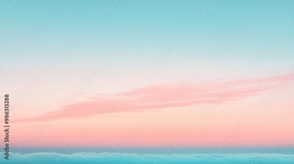 Soft gradient of blue and peach in the sky just before sunrise