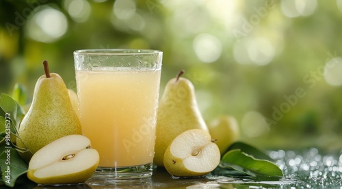 Freshly squeezed pear juice surrounded by ripe pears in a lush garden on a su...