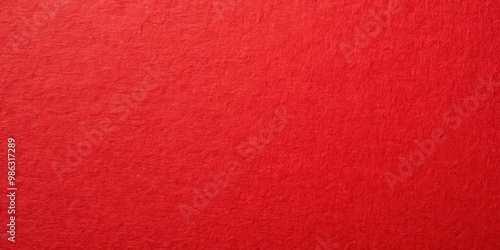 Close-up shot of the vibrant red paper with a dense cardboard texture