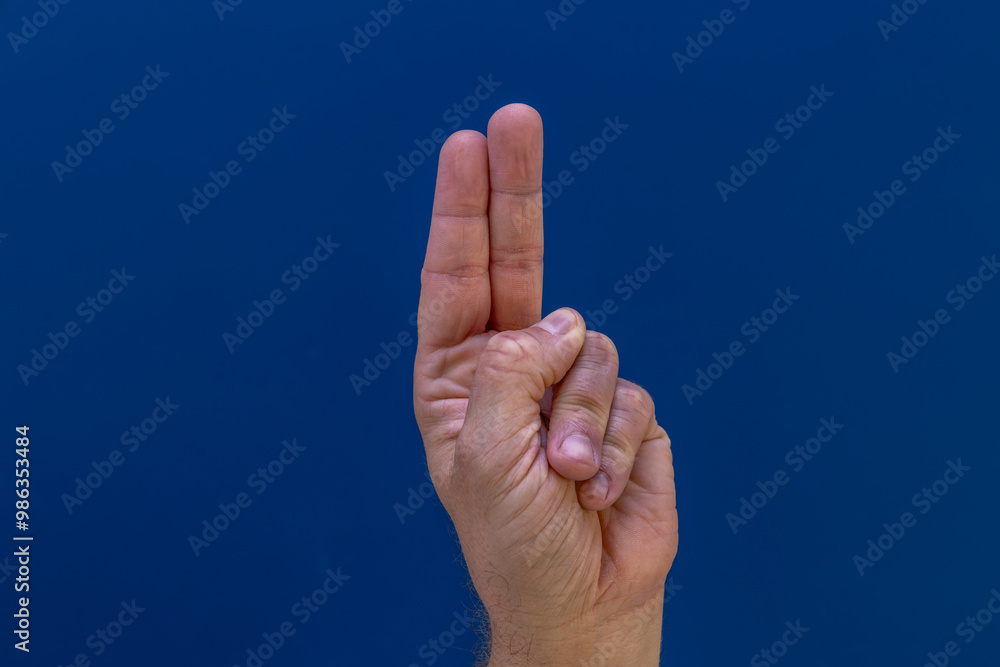 A clenched male hand into a fist, how to stop violence, preparation for fight, stop violence, internet hate
A clenched male hand into a fist, how to stop violence, preparation for fight, stop violence, internet hate
