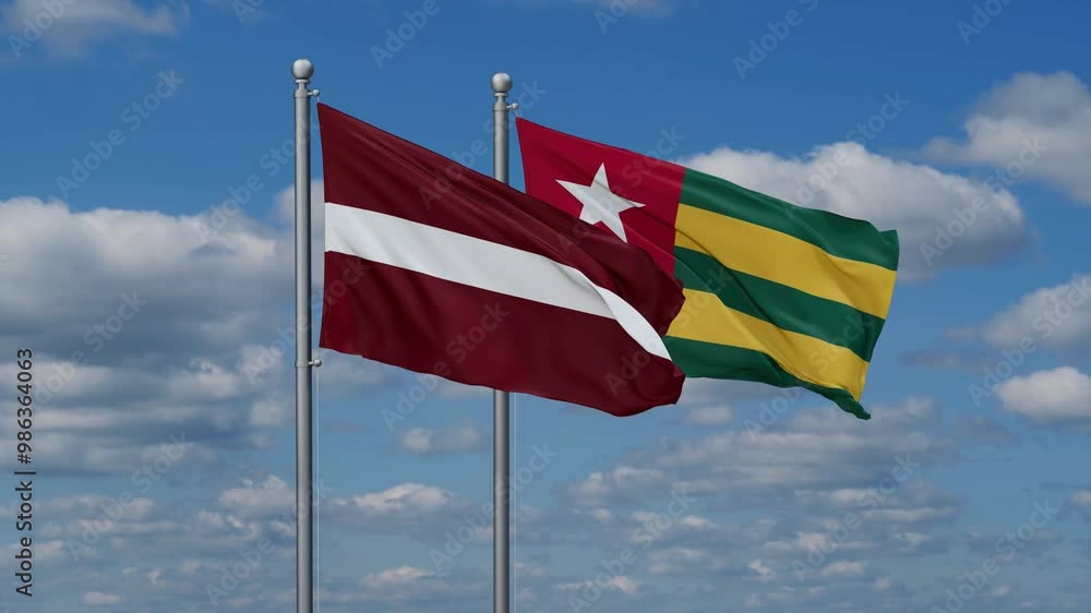 Togo, Togolese Republic and Latvia flags flying together, video concept of the relationship, two country cooperation concept Togo, Togolese Republic and Latvia flags flying together, video concept of the relationship, two country cooperation concept