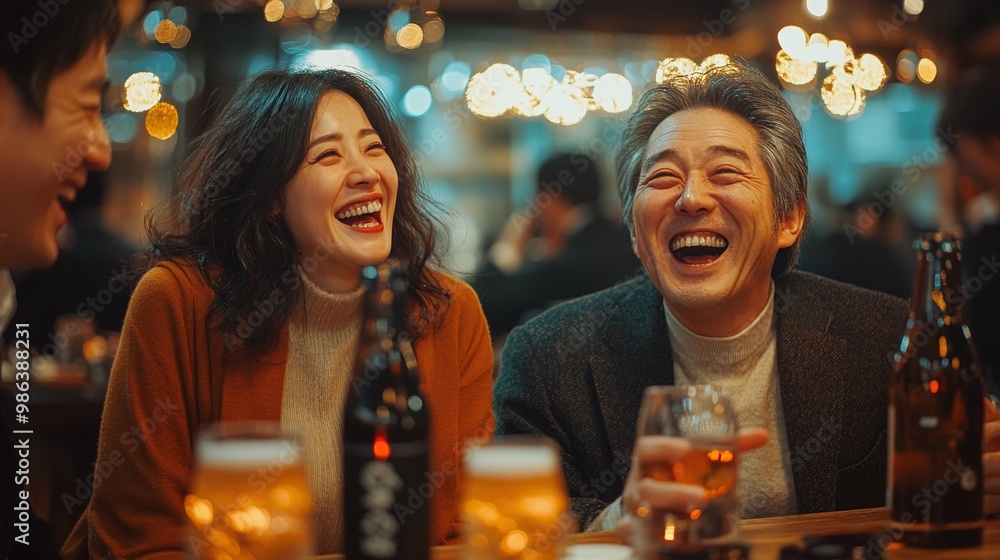 happy asian adults enjoying a party in a bar laughing together with drinks in hand celebrating friendship and joy in a casual evening gathering filled with excitement fun and entertainment happy asian adults enjoying a party in a bar laughing together with drinks in hand celebrating friendship and joy in a casual evening gathering filled with excitement fun and entertainment