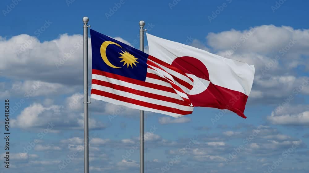 Greenland and Malaysia flags flying together, video concept of the relationship, two country relations concept Greenland and Malaysia flags flying together, video concept of the relationship, two country relations concept