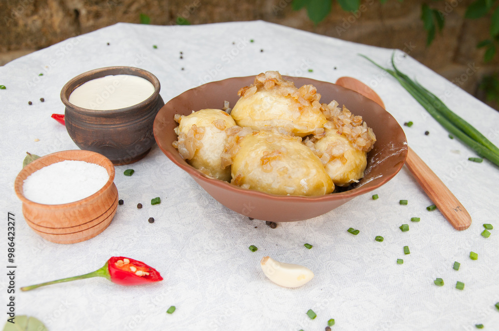 beautifull ukranian food on the traditional table with green, salt, pepper, spices beautifull ukranian food on the traditional table with green, salt, pepper, spices