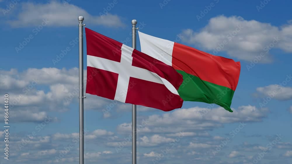 Madagascar and Denmark flags flying together, video concept of the relationship, two country relations concept Madagascar and Denmark flags flying together, video concept of the relationship, two country relations concept