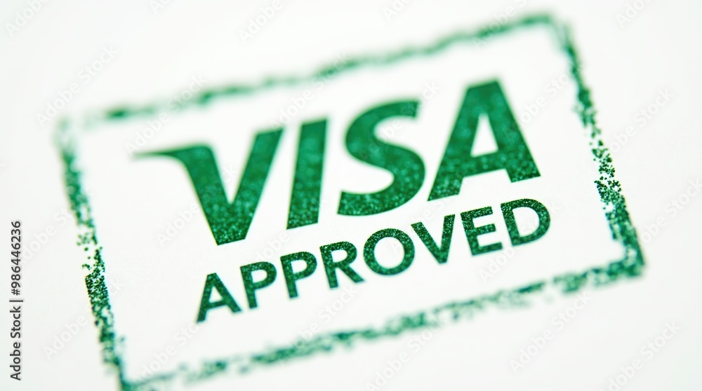 Visa approved green stamp on white paper background Visa approved green stamp on white paper background