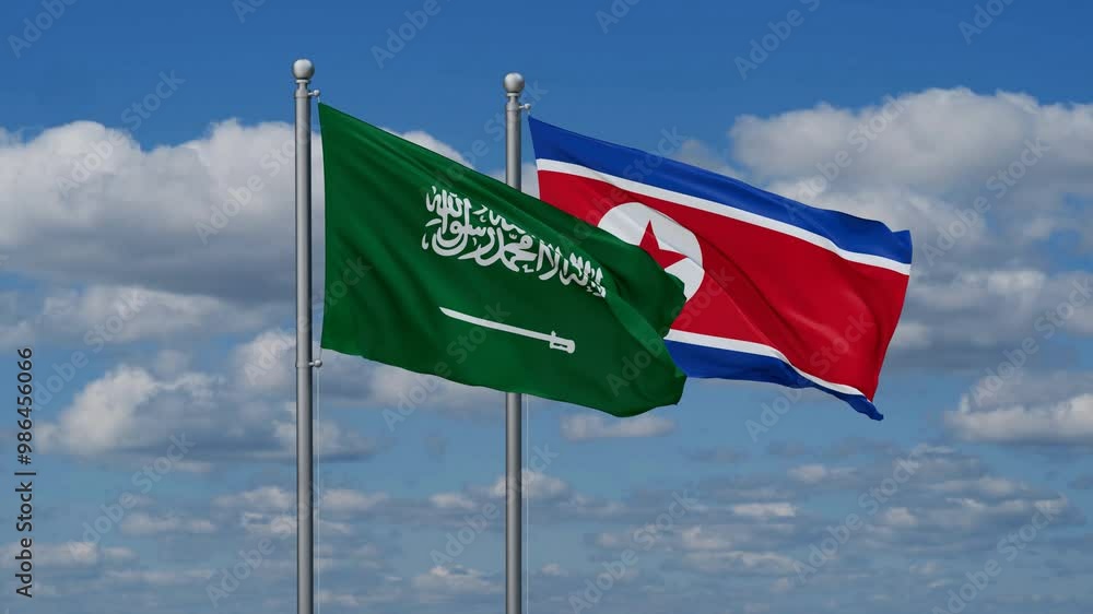 North Korea and Saudi Arabia flags flying together, video concept of the relationship North Korea and Saudi Arabia flags flying together, video concept of the relationship